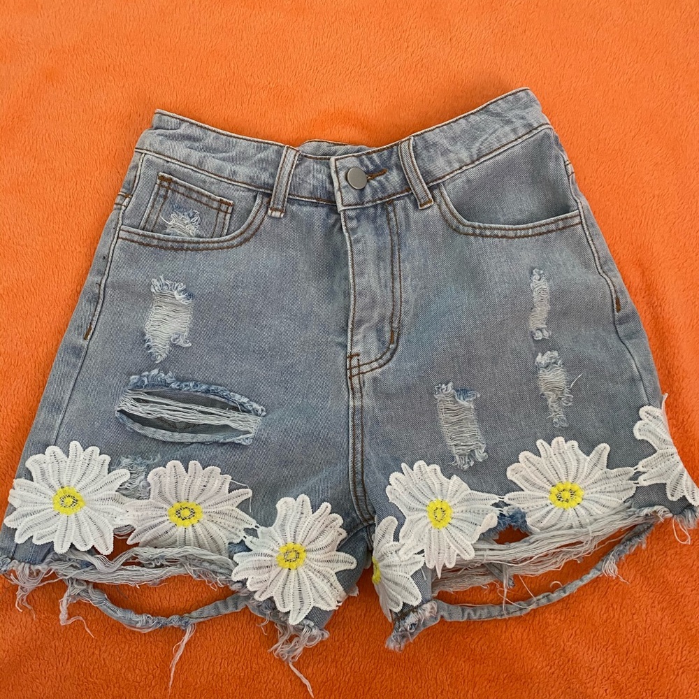 Floral ripped denim jeans